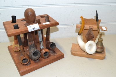Lot 92 - Two stands various tobacco pipes