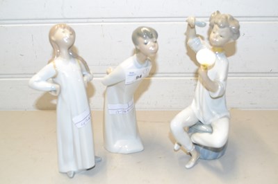 Lot 94 - Two Lladro figures and one other