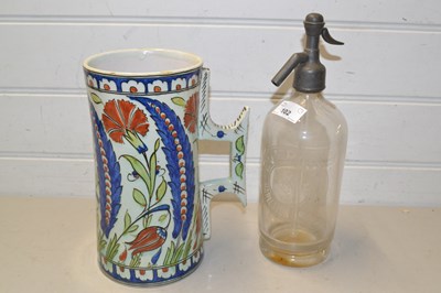 Lot 102 - Soda syphon and a large pottery mug