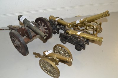 Lot 155 - Four brass model cannons and one other (5)