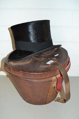 Lot 163 - Dunn & Co black top hat with leather case