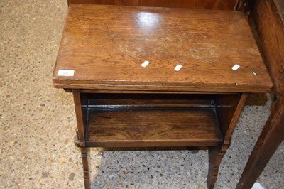 Lot 263 - Small oak fold top coffee table with base...