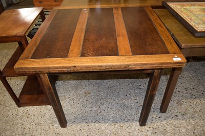 Lot 338 - Mid 20th Century oak draw leaf dining table