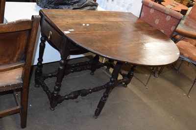 Lot 810 - 18th Century oak oval drop leaf dining table...