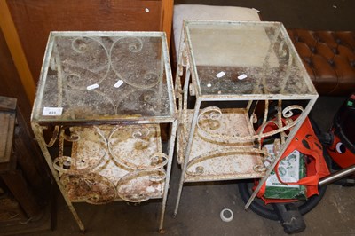 Lot 833 - A pair of metal framed glass top bedside...