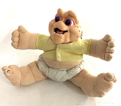 Lot 164 - A 1990s pull-action talking Baby Sinclair from...