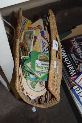 Lot 608 - Basket containing a quantity of vintage beer mats