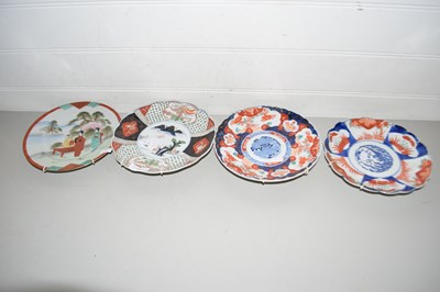 Lot 10 - Three various Imari wall plates and one other