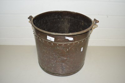 Lot 51 - Riveted copper coal bucket with floral decoration