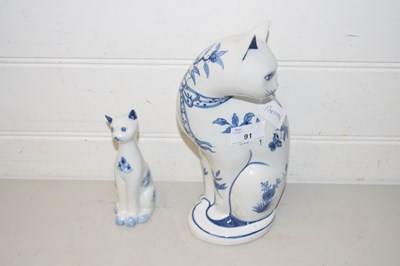 Lot 91 - Two modern pottery models of cats