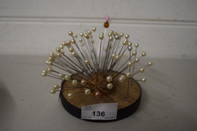 Lot 136 - Cork pin cushion with a selection of pins with...