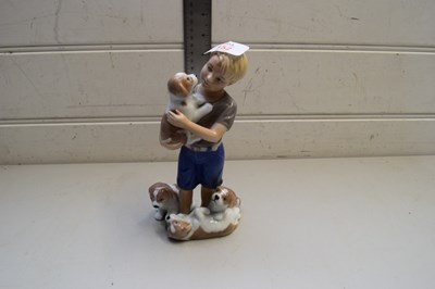 Lot 152 - ROYAL COPENHAGEN MODEL OF A BOY WITH PUPPIES