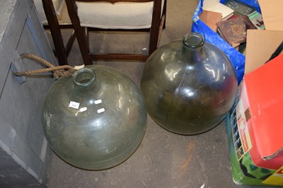 Lot 808 - Two large glass carbuoy