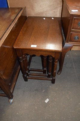 Lot 883 - Nest of three oak tables