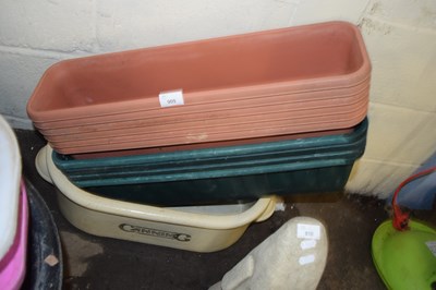 Lot 909 - Quantity of plastic planters and a large...