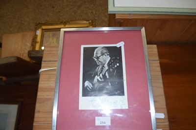 Lot 254 - Framed black and white photograph of a guitar...