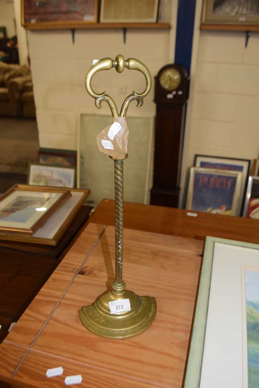 Lot 272 - Brass door stop