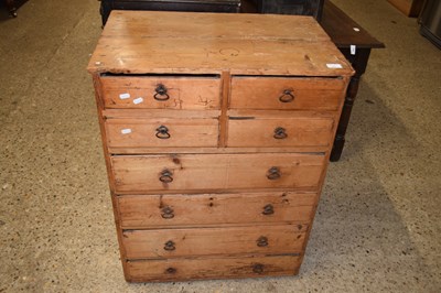 Lot 341 - Antique pine eight drawer chest with ringlet...