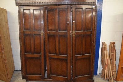 Lot 374 - Early 20th Century large oak three door wardrobe