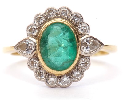 Lot 9 - 18ct gold emerald and diamond cluster ring,...