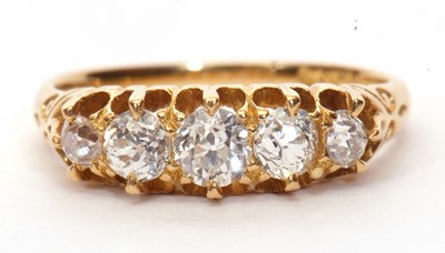 Lot 11 - 18ct gold five stone diamond ring featuring...