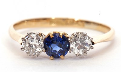 Lot 27 - Sapphire and diamond three stone ring, the...