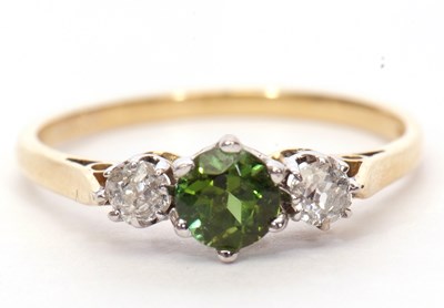 Lot 30 - 18ct gold green tourmaline and diamond three...