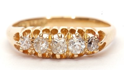 Lot 33 - A five stone diamond ring featuring five mixed...