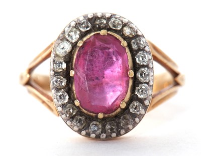 Lot 42 - Antique ruby and diamond cluster ring, the...