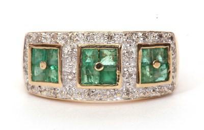 Lot 46 - Modern 9ct gold emerald and diamond cluster...