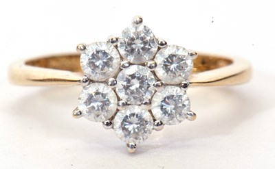 Lot 78 - Cubic Zirconia cluster ring, a flower head...