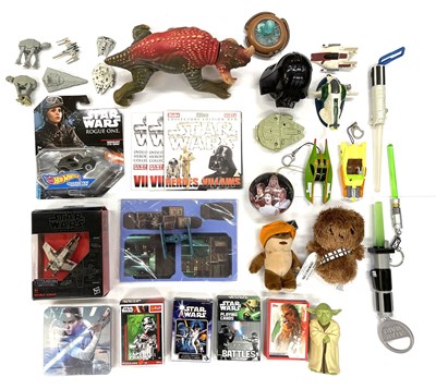 Lot 173 - A mixed lot of Star Wars collectibles and toys,...