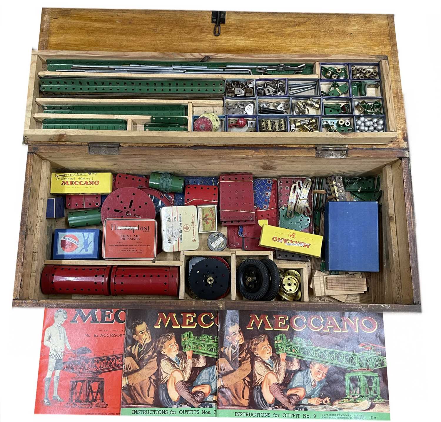 Lot 69 - A large wooden box of mixed vintage Meccano,...