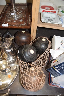 Lot 667 - Group of four hardwood lawn bowls