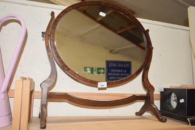 Lot 669 - Oval dressing table mirror in mahogany frame