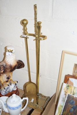 Lot 713 - Brass fire tool stand with tools