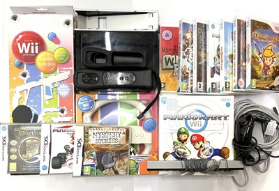 Lot 227 - A Nintendo Wii Console in black and a quantity...