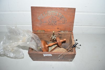 Lot 7 - Small box of base metal and wood hat pin...