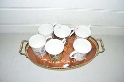 Lot 13 - Oval serving tray and a quantity of mugs