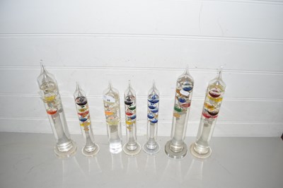 Lot 35 - Collection of seven glass Galileo type...