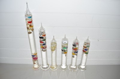 Lot 40 - Six various glass Galileo thermometers