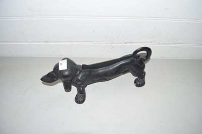 Lot 47 - Cast iron boot scraper formed as a Dachshund