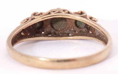 Lot 11 - 9ct gold turquoise three stone ring featuring...