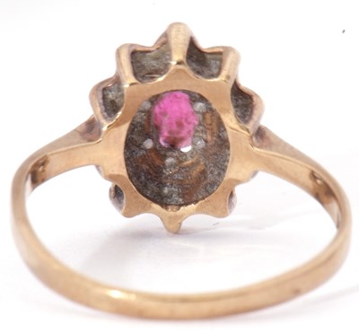 Lot 13 - 9ct gold ruby and diamond cluster ring, the...