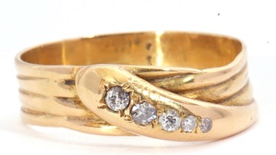 Lot 27 - 18ct stamped diamond set serpent ring, the...