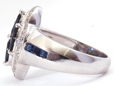 Lot 35 - Modern sapphire and diamond cluster ring...