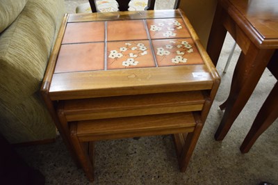 Lot 268 - Nest of three tile top tables