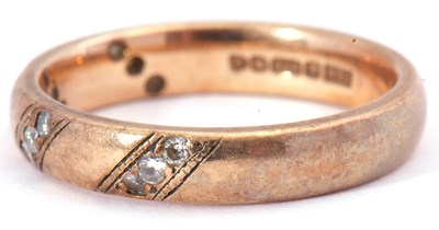 Lot 51 - 9ct gold and diamond ring featuring four small...