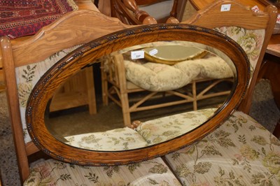 Lot 337 - Oak framed bevelled wall mirror