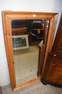 Lot 400 - Pine framed bevelled wall mirror